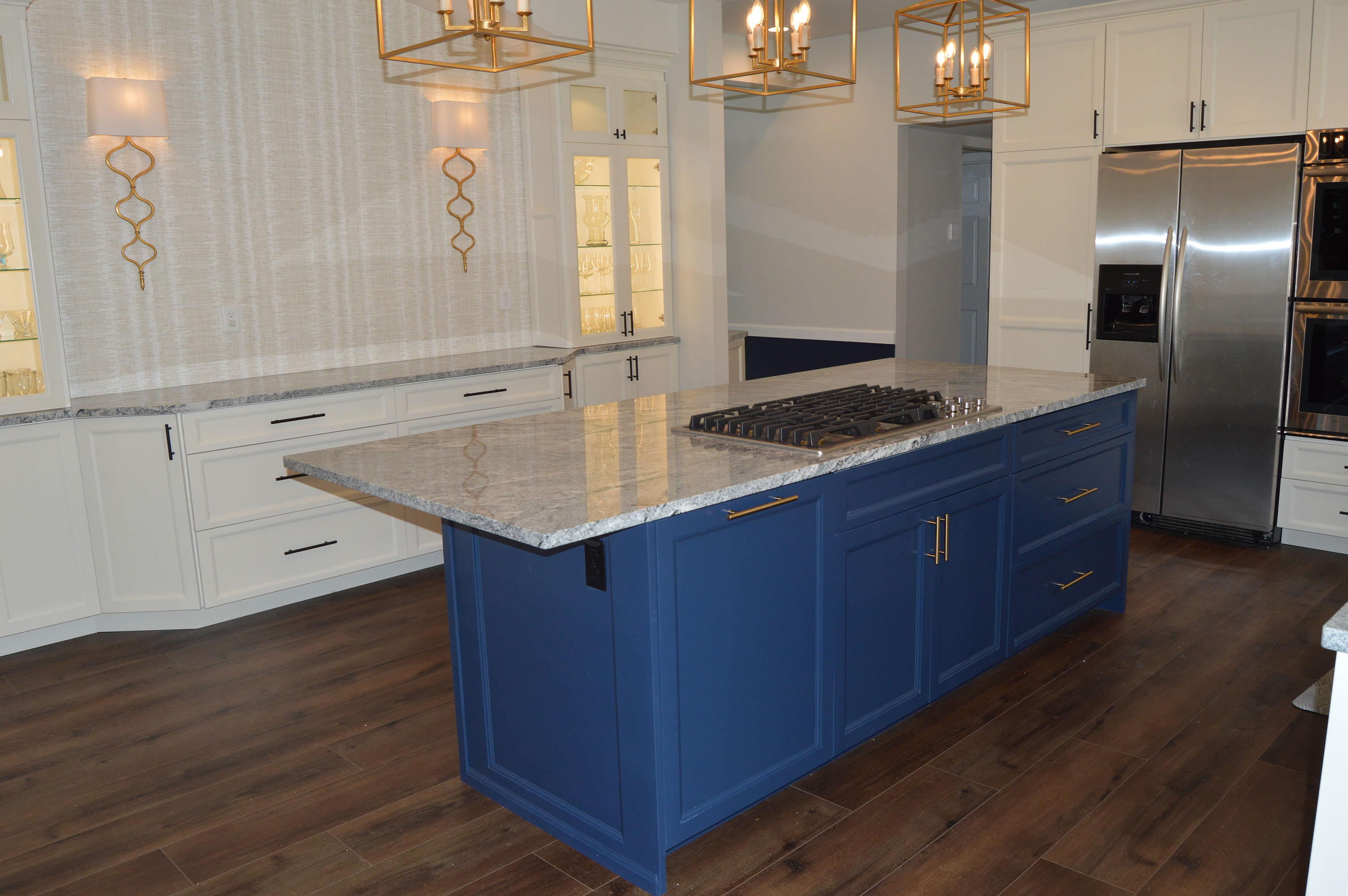 Blue accent island kitchen design - custom cabinetry